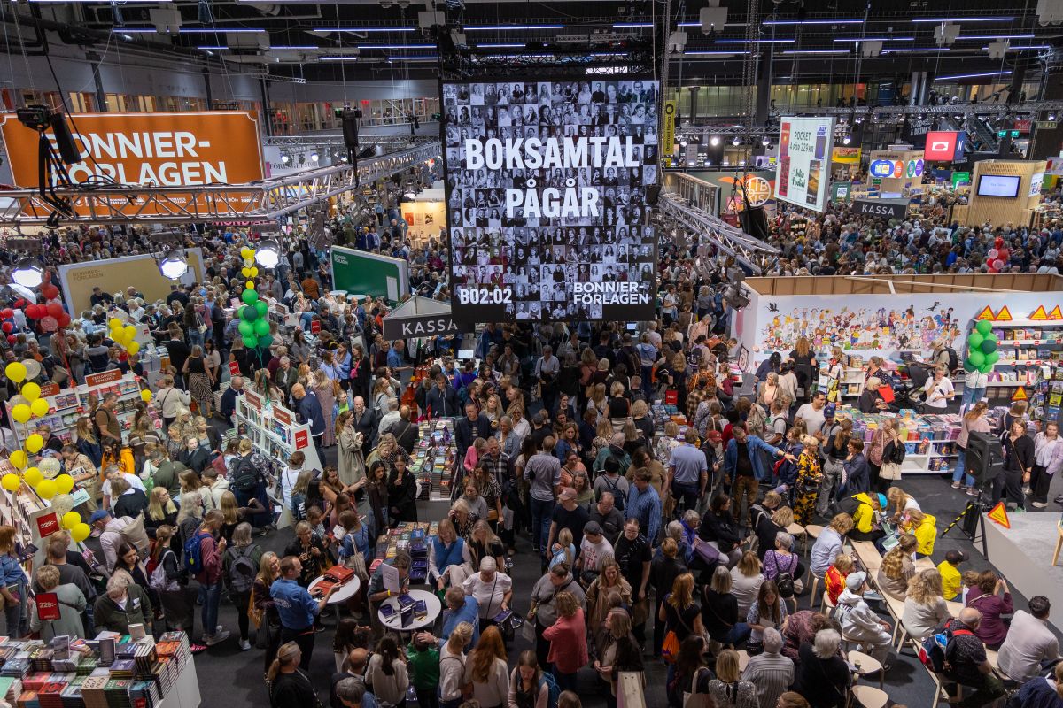View of large crowds milling around Göteborg book fair.