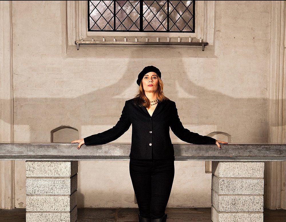 Gabriella Håkansson standing in front of stone altar