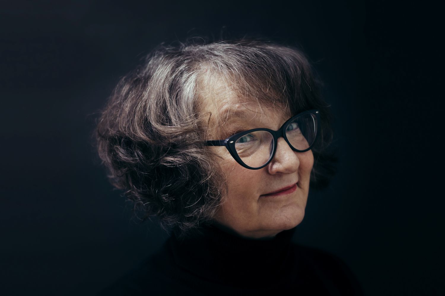 Portrait of Monika Fagerholm against a black background