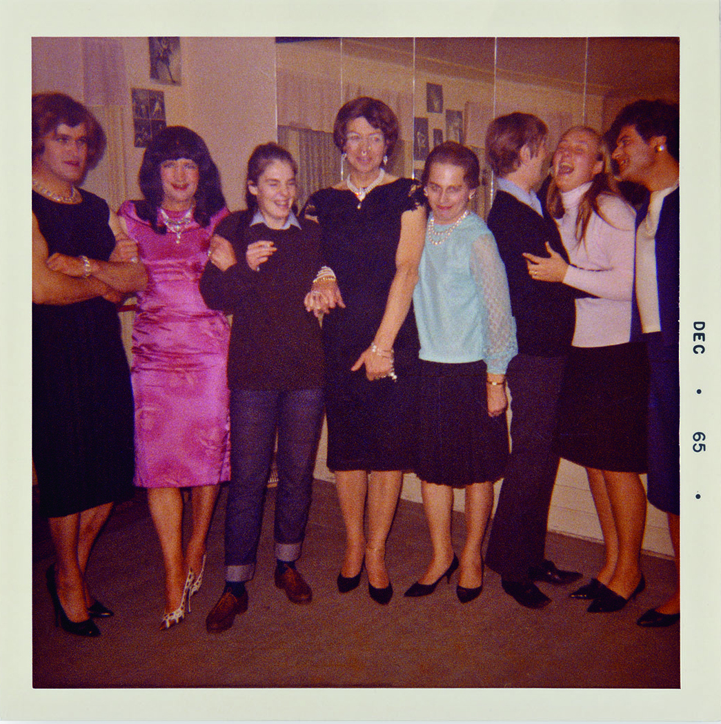 Photo of group of women in high spirits at a gathering.