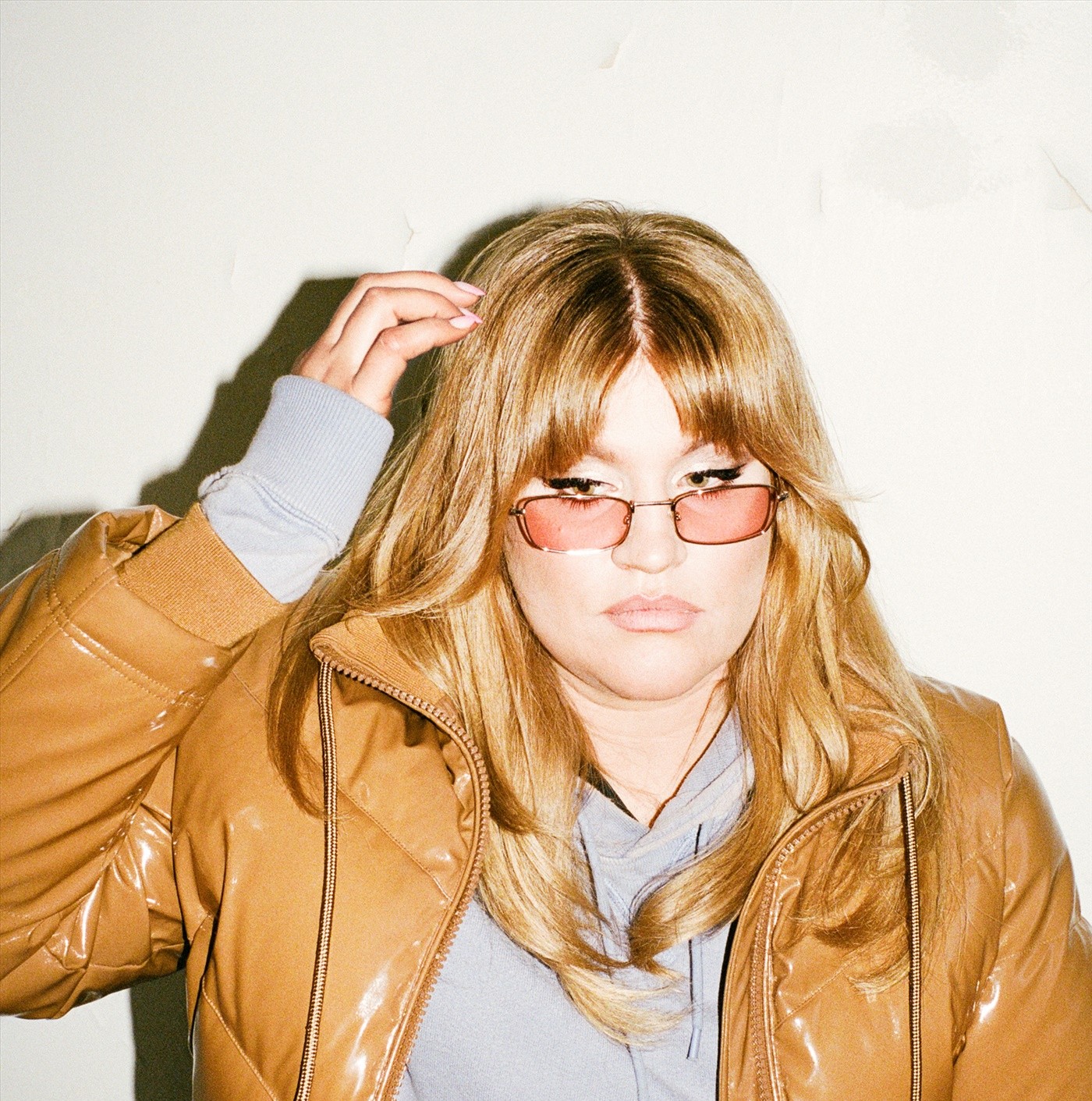 Tone Schunnesson wearing sunglasses and a puffer jacket