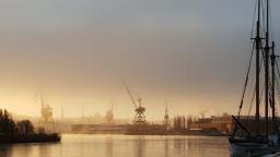 Gothenburg port in golden clouds.