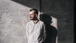 Anders Teglund casting a strong shadow against a stony background.